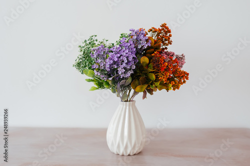 bouquet in a vase light background