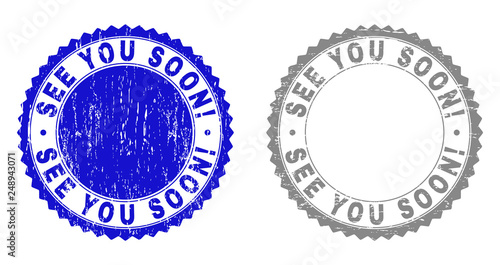 Grunge SEE YOU SOON! stamp seals isolated on a white background. Rosette seals with grunge texture in blue and gray colors. Vector rubber stamp imprint of SEE YOU SOON! text inside round rosette.