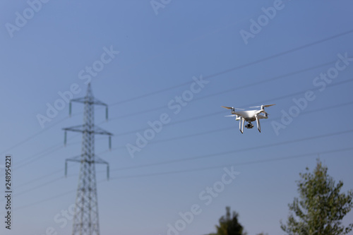 Flying drone doing an industrial inspection © tostphoto