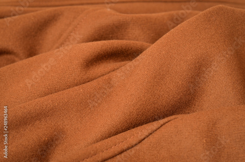 Wrinkled brown woolen fabric for background