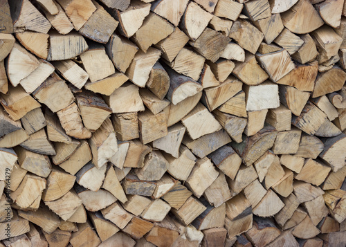 Background with chopped wooden logs