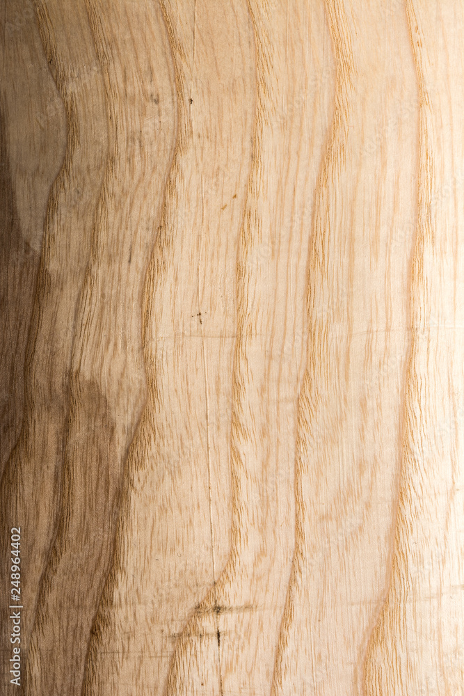 Naklejka premium embossed wood texture with wavy lines and wood fibers