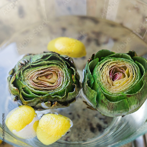 Fresh artichokes on board photo