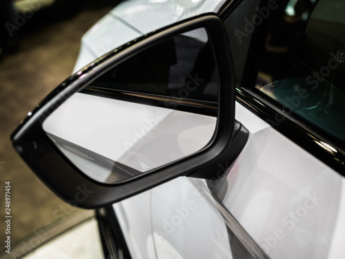 A wing or fender mirror, door mirror, outside rear-view or side view on the exterior of motor vehicles for the purposes of helping the driver see areas behind and blind spot