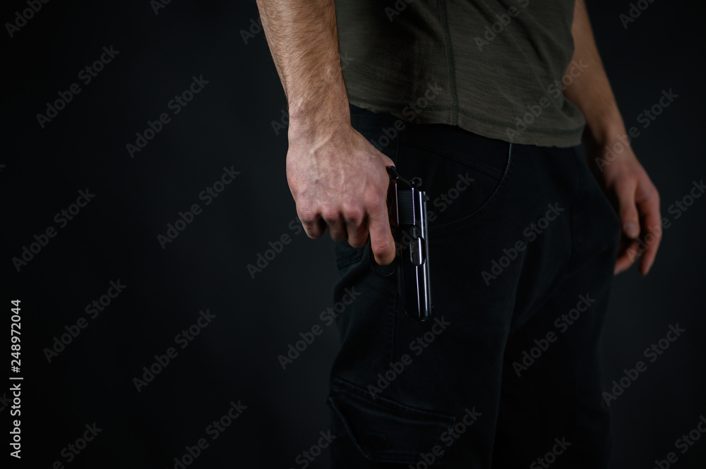 custom made wallpaper toronto digitalMan with a pistol in the hand