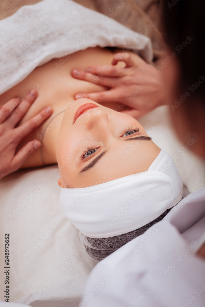 Top view of a nice young woman in the spa Top view of a nice young woman in the spa