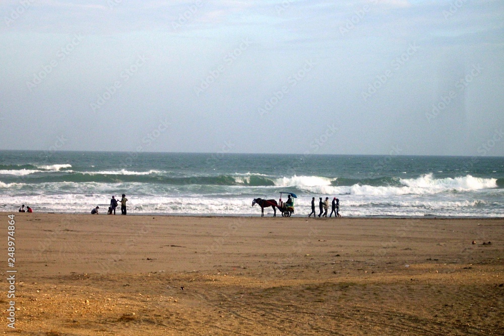 people are playing happily in the beach