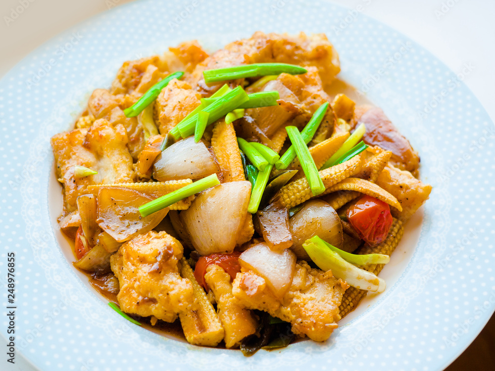 Thai-Chinese food, Stir-fried Crocodile with black pepper. Chicken, pork. Thai-Chinese food, Stir-fried Crocodile with black pepper. Chicken, pork.