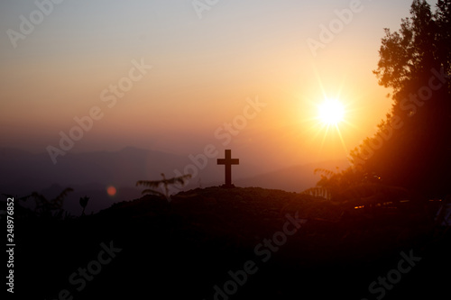 Resurrection concept Crucifixion Of Jesus Christ Cross At Sunset