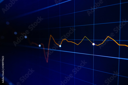 Stock exchange market graph on LED screen for business concept.