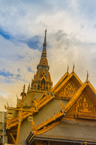 Beautiful Thai's style craving and decoration on the golden gable end at Wat Sothonwararam, a famous public temple in Chachoengsao Province, Thailand.