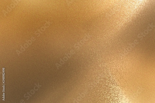Glowing bronze steel wall texture, abstract background