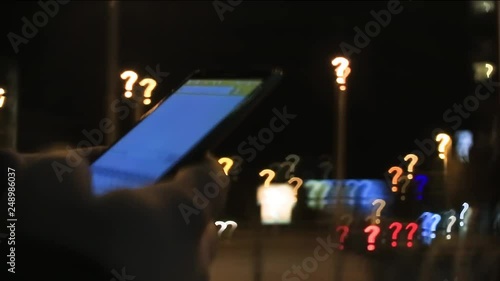 Sending messages from a mobiel outside on the street photo