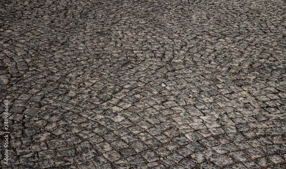 old stone pavement closeup texture background old stone pavement closeup texture background