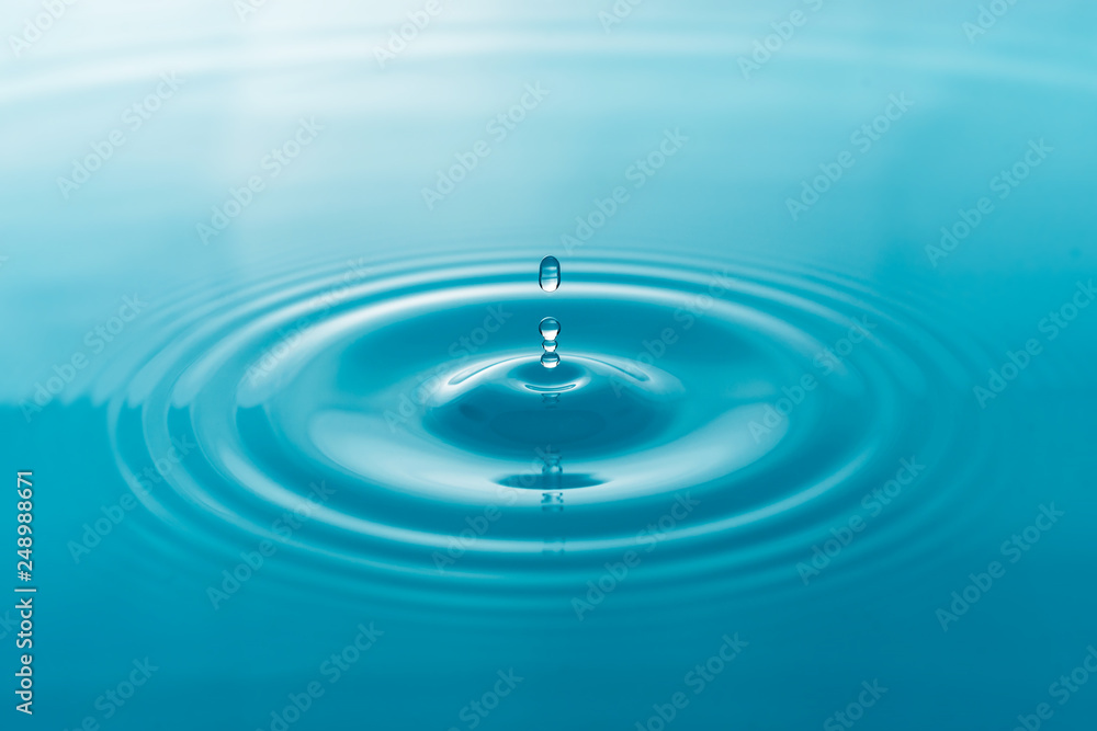 Water droplets on surface water background Water droplets on surface water background