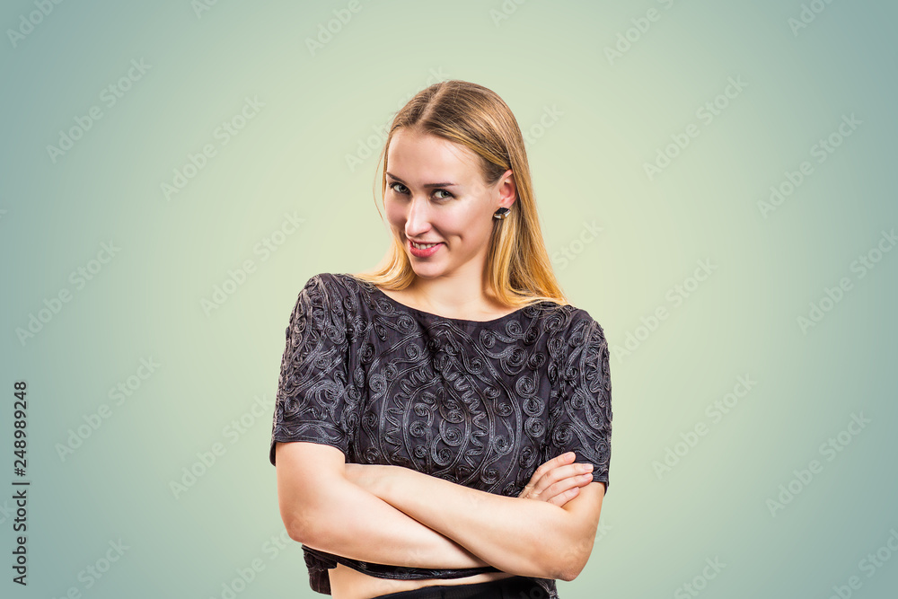 Fototapeta premium Woman with blonde hair smiling flirty