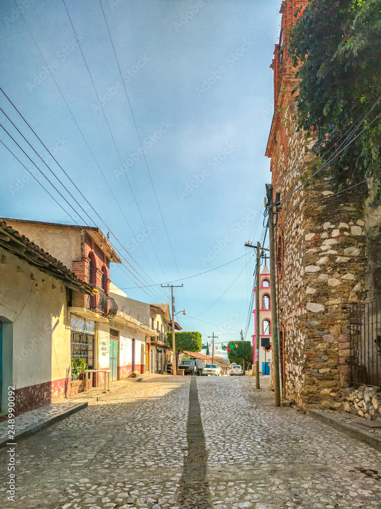 Downtown district, main street entering Ixcateopan. Main streets in Guerrero. Travel in Mexico.
