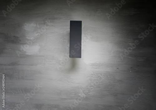 Concrete wall with lamp hang