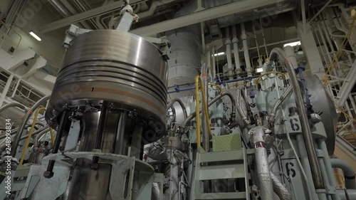 New piston near large marine diesel engine