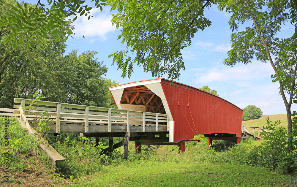 Cedar Bridge under trees - Winterset, Iowa Cedar Bridge under trees - Winterset, Iowa