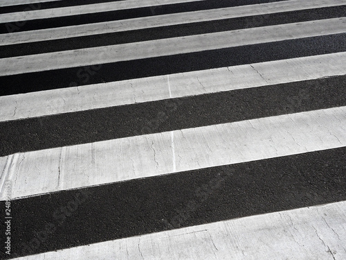 Canvas Print Detail of crosswalk in a city, black and white, Zebra crossing with nobody