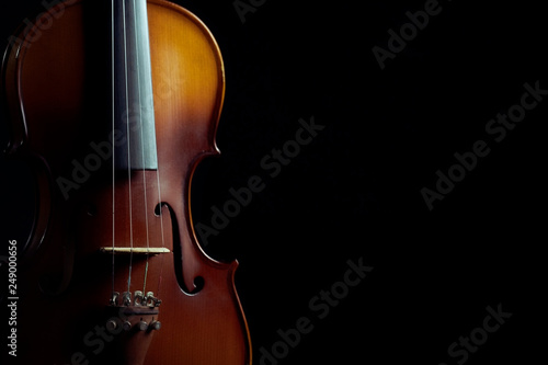 Close up violin on black background
