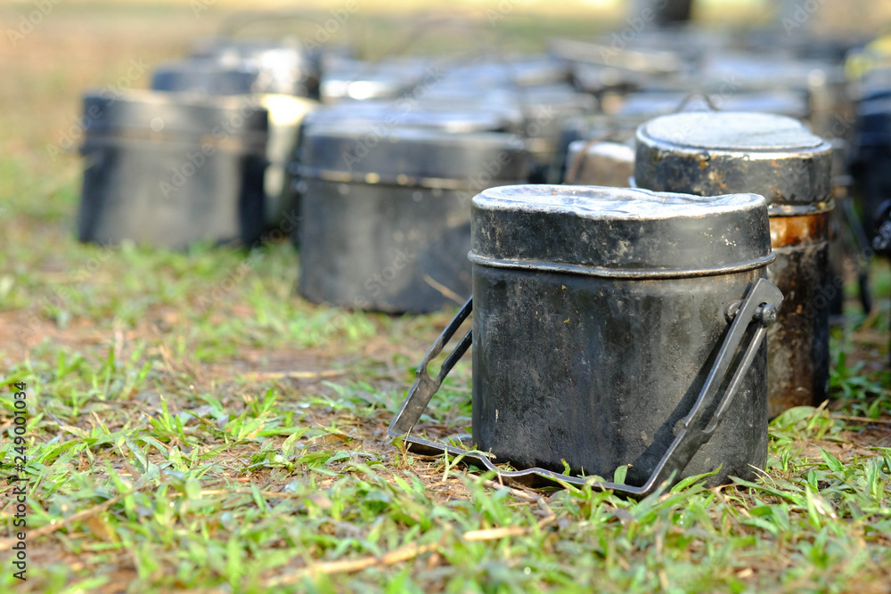 pot for camping,Black pot and golden food plate for soldiers in field training.black Strand