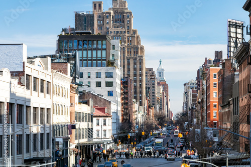 Photography Busy view of 14th Street with crowds of people scene from the Highline Park in C