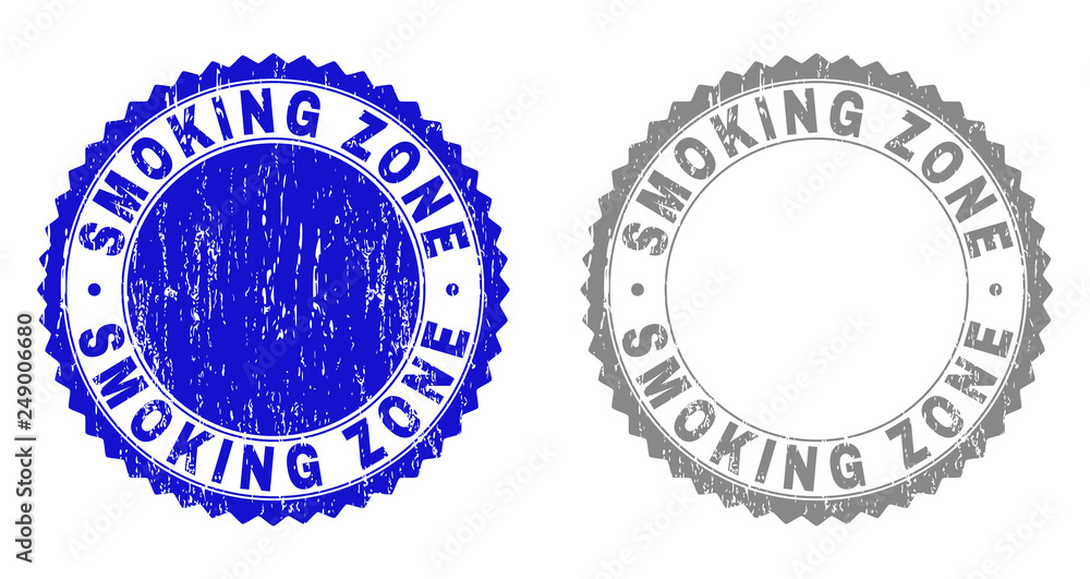 Grunge SMOKING ZONE stamps isolated on a white background. Rosette seals with grunge texture in blue and gray colors. Vector rubber stamp imprint of SMOKING ZONE text inside round rosette.