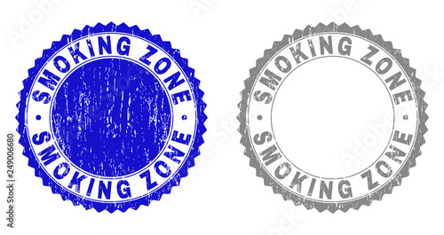 Grunge SMOKING ZONE stamps isolated on a white background. Rosette seals with grunge texture in blue and gray colors. Vector rubber stamp imprint of SMOKING ZONE text inside round rosette.