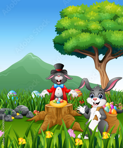 The rabbit plays magic on the tree stump