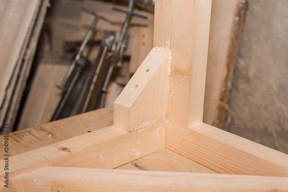Wooden details. Details glued to each other. Carpentry workshop. Wooden details. Details glued to each other. Carpentry workshop.
