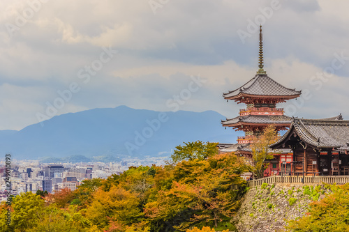 View of Kyoto city from Kiyomizu temple with dramatic cloudy sky on background.