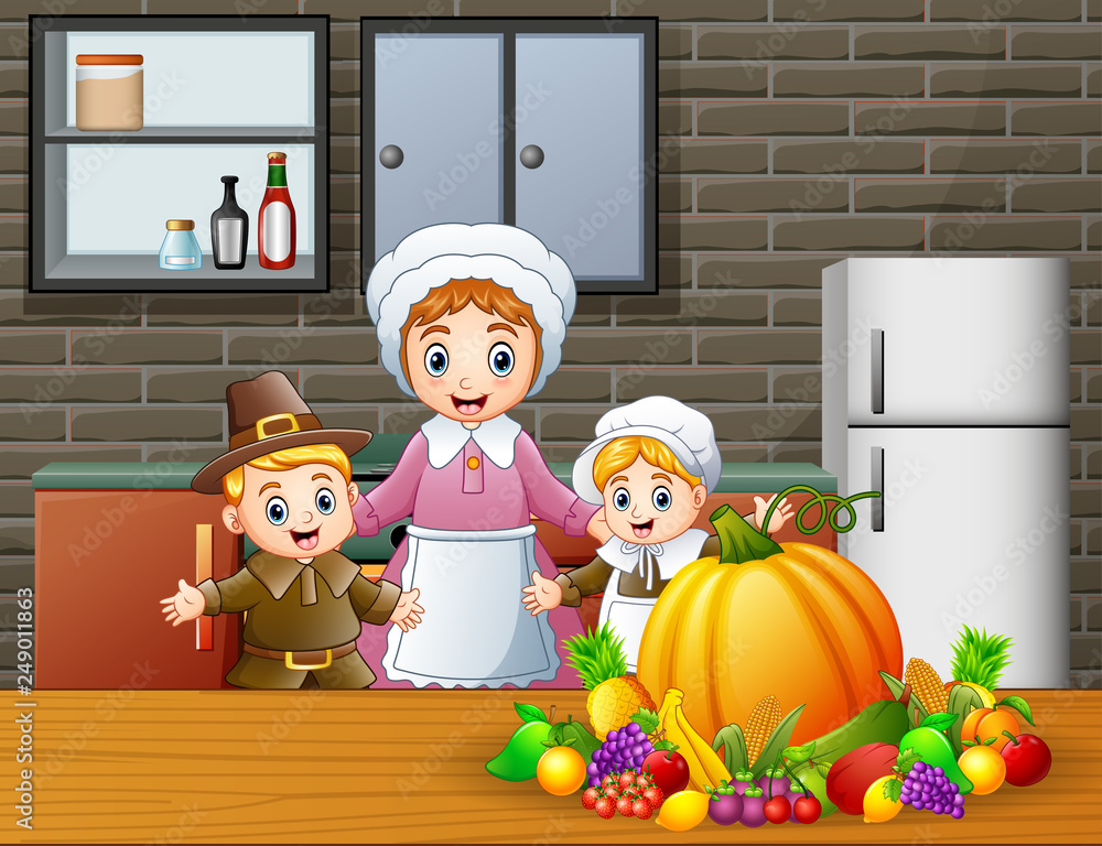 Happy children and mom in the kitchen Happy children and mom in the kitchen