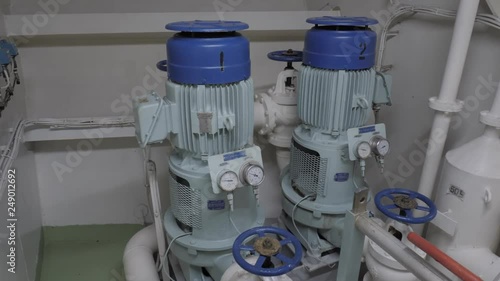 Pumps of water cooling system with electric motors