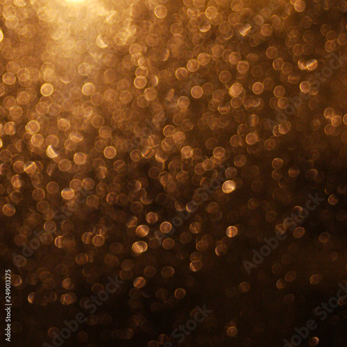 abstract blurred glowing lights of light gold shades
