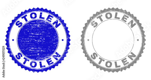 Grunge STOLEN stamp seals isolated on a white background. Rosette seals with grunge texture in blue and gray colors. Vector rubber stamp imprint of STOLEN label inside round rosette.