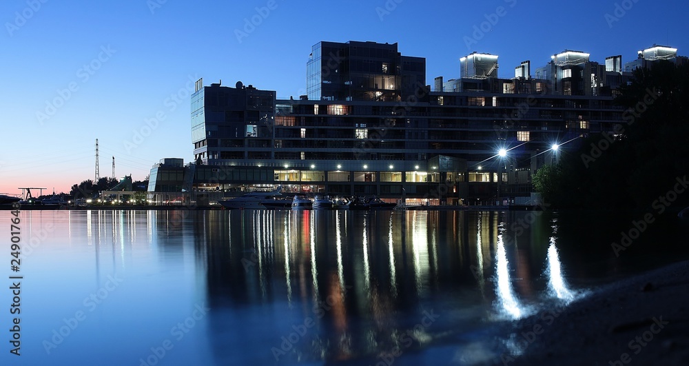 Fototapeta premium night pier on the city reservoir
