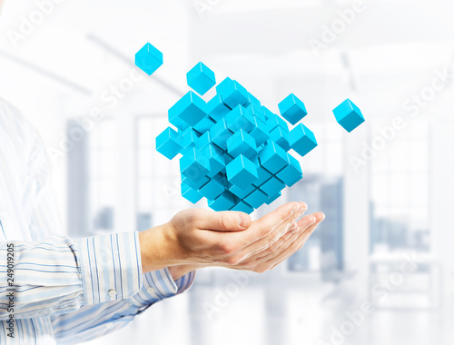 Fotografía Concept of technology integration and innovation presented by cube figure