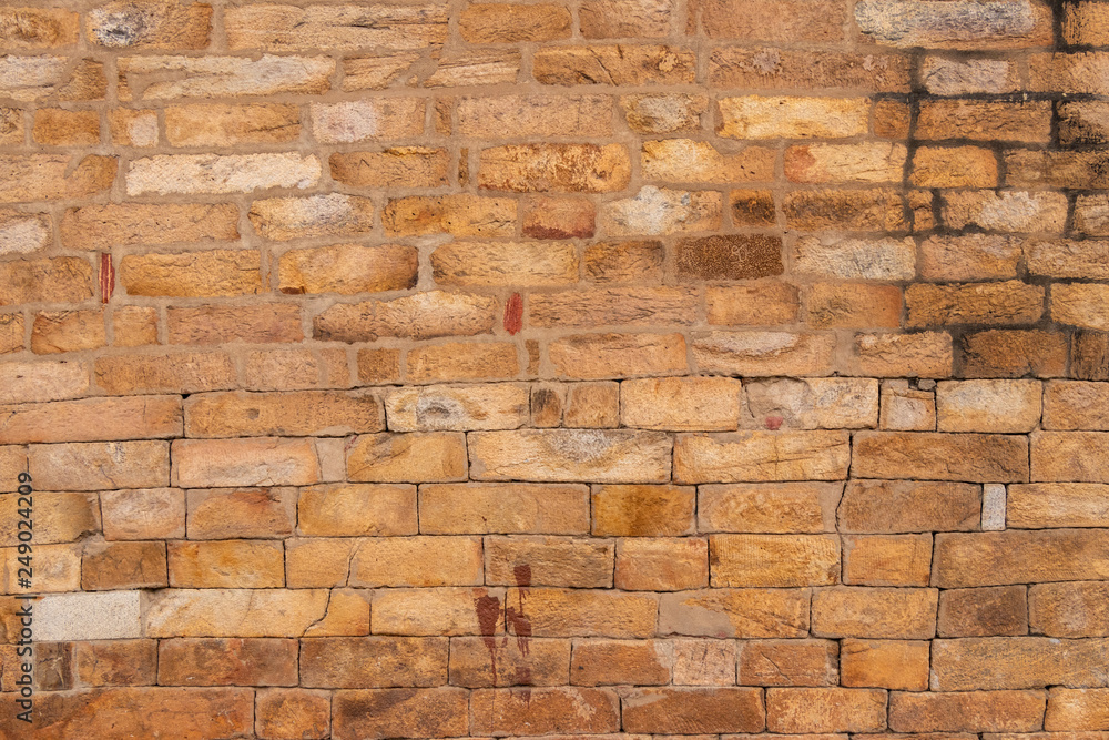 Fototapeta premium Texture of ancient stone wall