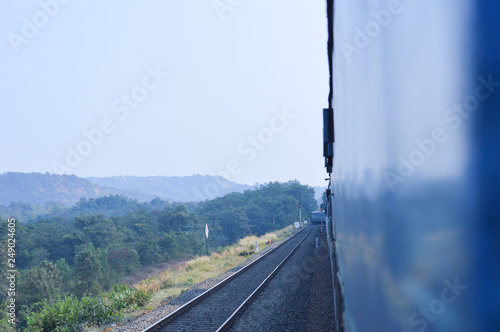 Looking outside the moving train in india 