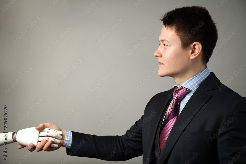 Fotografie Prototype bionic prosthesis in hands of businessman