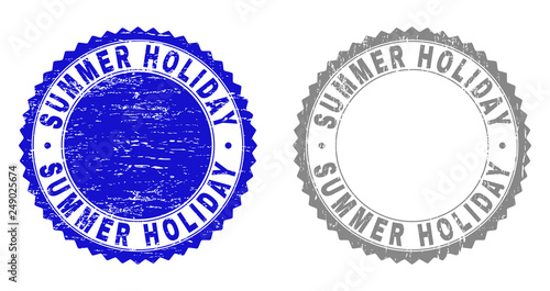 Grunge SUMMER HOLIDAY stamp seals isolated on a white background. Rosette seals with grunge texture in blue and grey colors. Vector rubber stamp imprint of SUMMER HOLIDAY caption inside round rosette.
