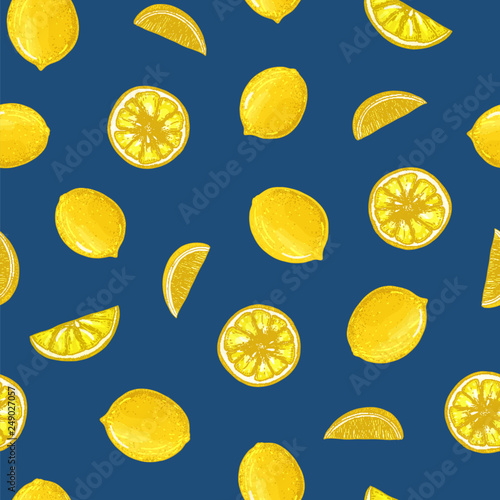 Hand drawn seamless pattern with lemons, whole and cut into pieces on blue background