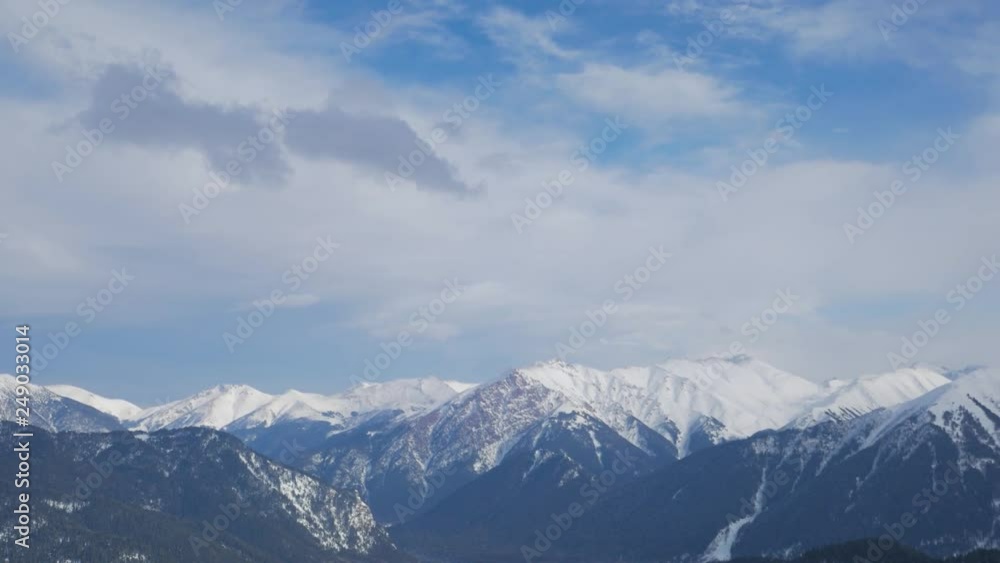 View snow covered mountains. Travel concept and winter vacation. View snow covered mountains. Travel concept and winter vacation.