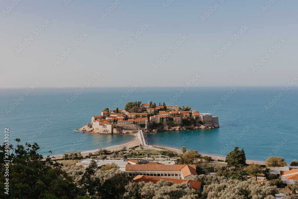Sveti Stefan island in Budva in a beautiful summer day, Montenegro - Image.