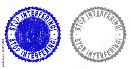 Grunge STOP INTERFERING! stamp seals isolated on a white background. Rosette seals with distress texture in blue and grey colors.