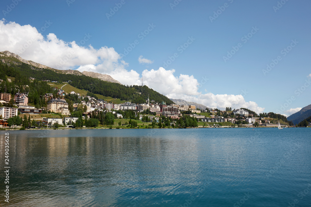 Fototapeta premium Sankt Moritz town and lake in a sunny summer day in Engadin, Switzerland