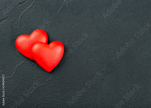 Two plastic hearts
