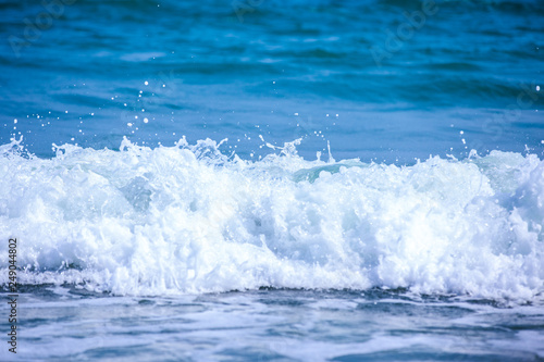 wave on the beach © Nattawat